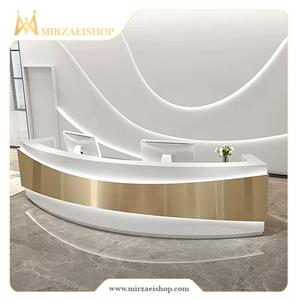 میز-لابی-منحنی-به-عنوان-نقطه-مرکزی-برای-خوش‌آمدگویی،-راهنمایی-و-انجام-امور-اداری-مهمانان-طراحی-شده-که-علاوه-بر-جذابیت-،-عملکردی-عالی-نیز-ارائه-دهد-